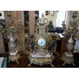 Continental ormolu, bronze and marble clock garniture set by Imperial, the clock being flanked by