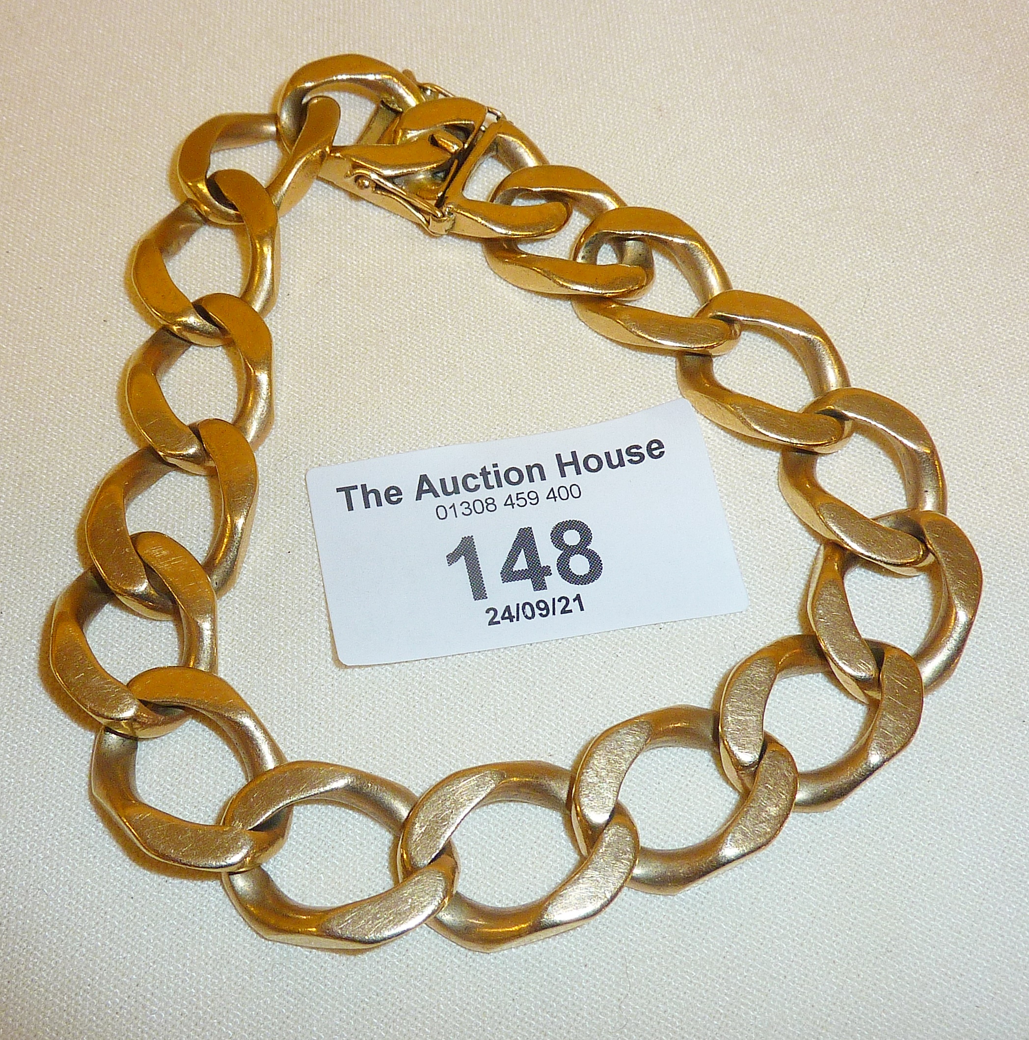 Heavy 9ct gold curb bracelet, approx. 64g.