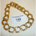 Heavy 9ct gold curb bracelet, approx. 64g.