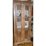 Middle Eastern food cupboard with two doors having iron bars