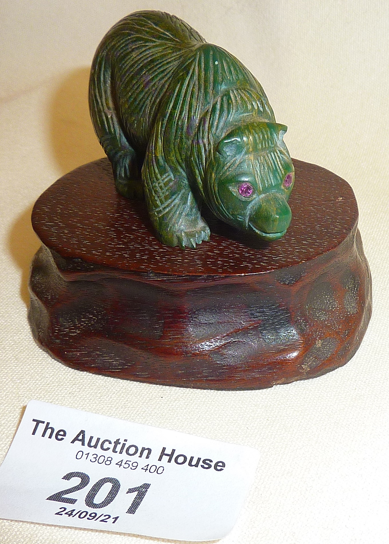 Small carved green hardstone Russian bear with red glass or semi-precious stone eyes, possibly - Image 3 of 3