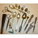 Hallmarked silver spoons, sewing scissors, silver and other thimbles, miniature enamelled chatelaine