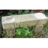 Small stone garden bench