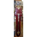 Presentation sword broadsword inscribed "The Columbus Sword" mounted on mahogany backboard, 4ft