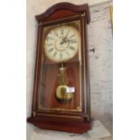 A President quartz Westminster chimes pendulum wall clock in mahogany case (working)