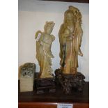 Chinese carved soapstone figure of an Immortal, a Japanese soapstone figure of a geisha and two