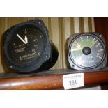 Two aircraft cockpit gauges, inc. pressure gauge by Kelvin Bottomley & Baird, and a torque gauge