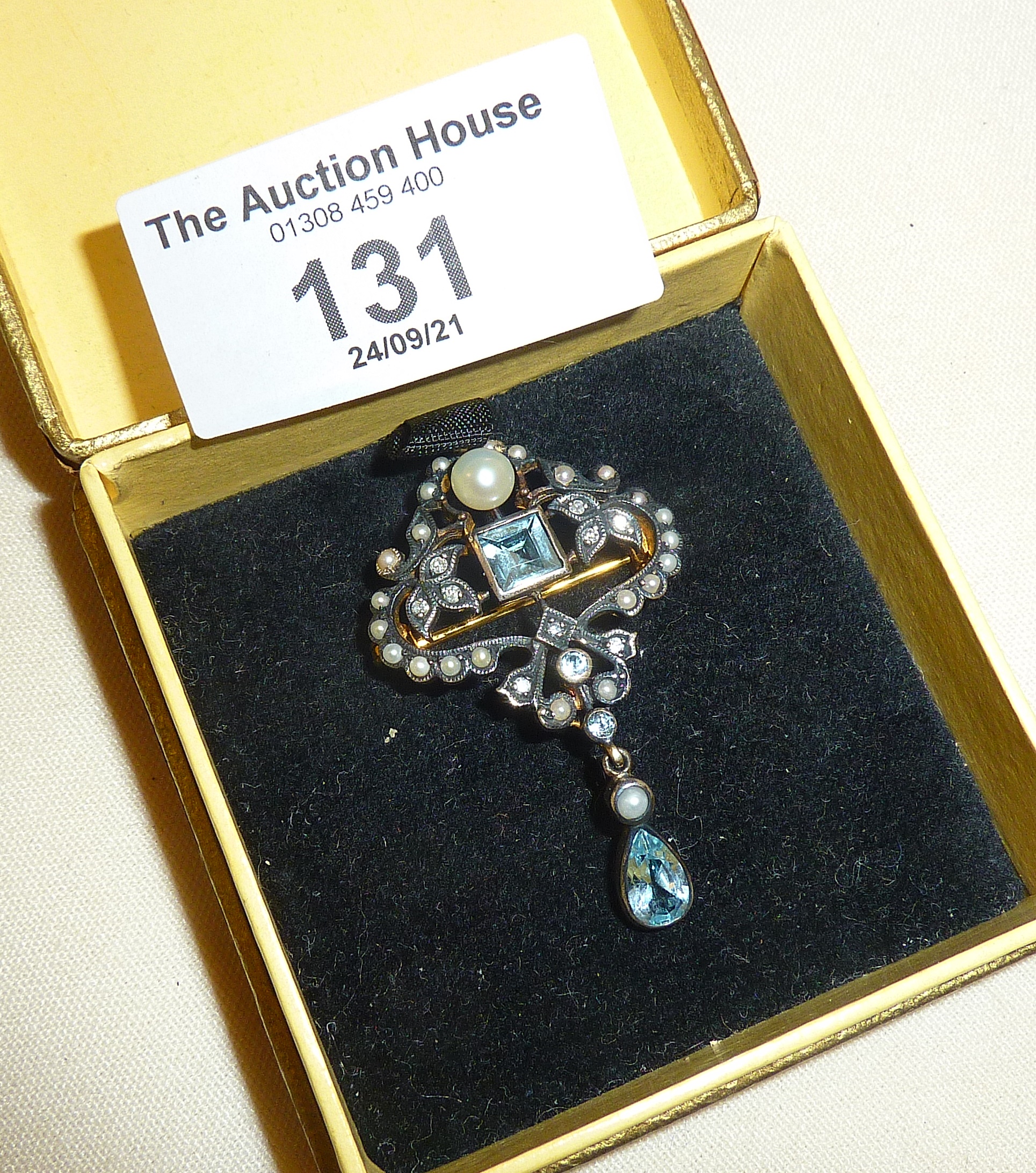 Gold brooch (untested), set with seed pearls, diamonds and an aquamarine drop