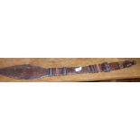 Tribal Art: A North African sword with native-made iron blade with leather hilt and sheath, the