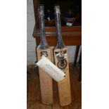Two cricket bats both autographed by international cricketers, inc. Clive Lloyd, David Gower, Ian