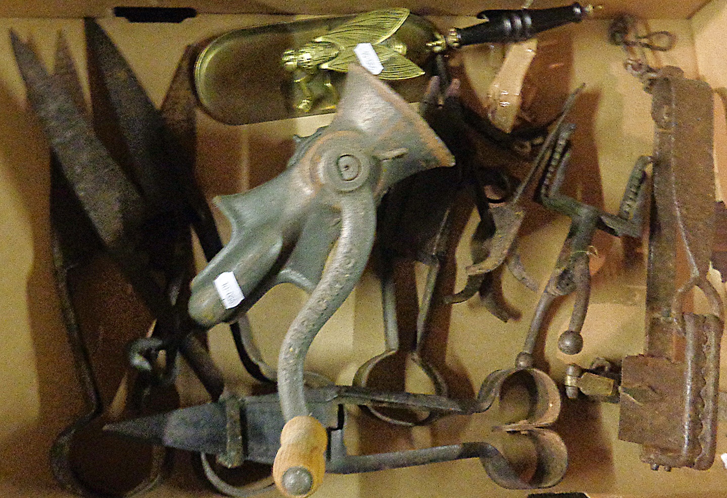 Old iron snares and traps, sheep shears and a mincer