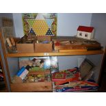 Large collection of wooden and other games, including Victorian block puzzles and building blocks