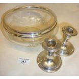 Silver rimmed cut glass bowl, with two Sterling weighted candlesticks