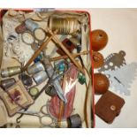 Collection of old thimbles, sewing scissors, knitting gauges, lace bobbins, etc.