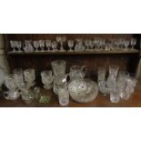 Cut glass tumblers, sundae dishes, water jugs and other glasses