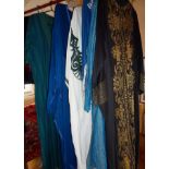 Ethnic vintage clothing: Moroccan embroidered robes, kaftans and tunic. Oriental suit with