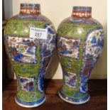 Pair of 18th c. Chinese vases over painted (clobbered), 25cm (one with chip)