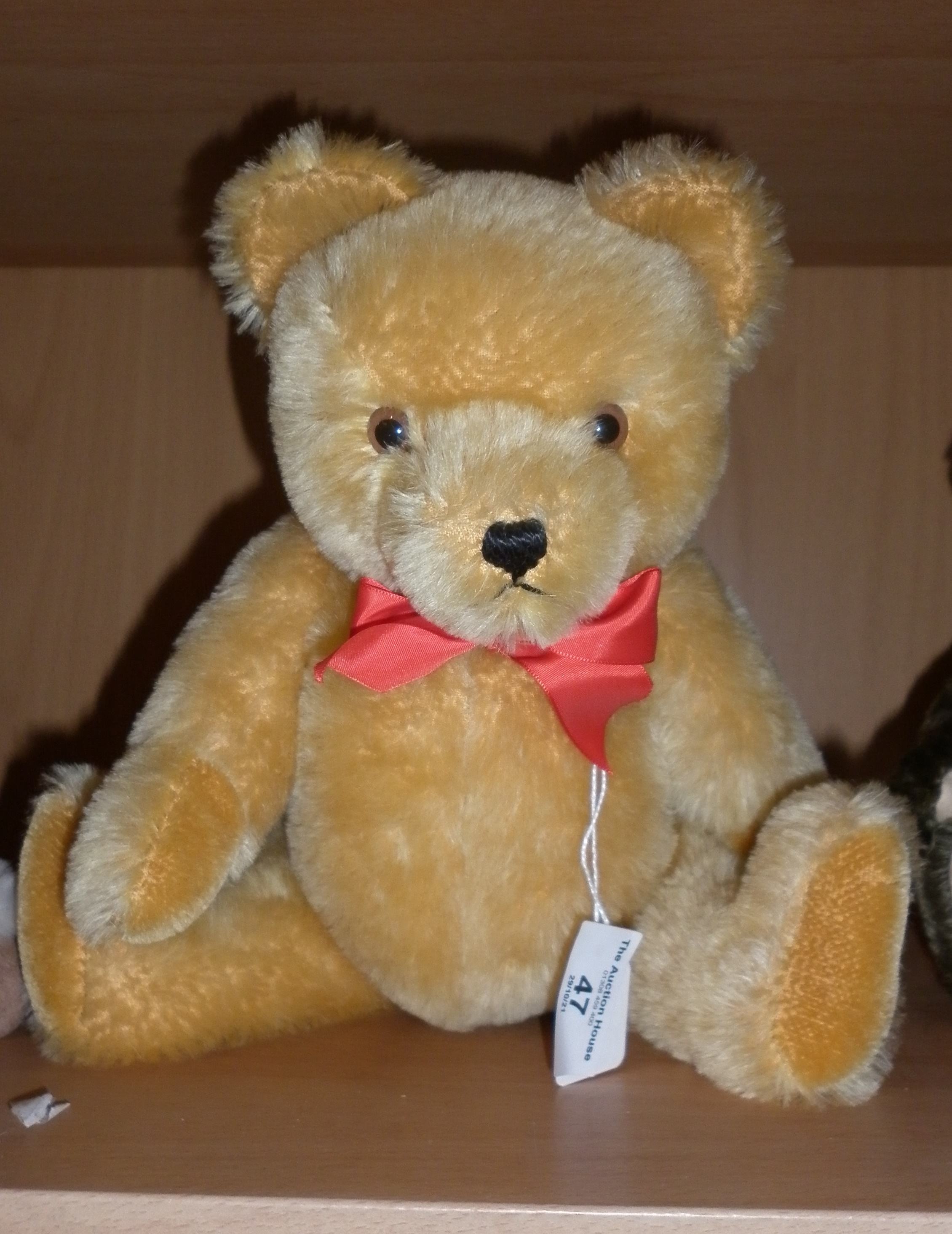 Hermann Teddy gold mohair with red bow
