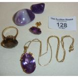 14ct gold mounted amethyst pendant necklace, a similar earring, 14ct topaz ring, polished