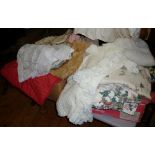 Two boxes of vintage fabrics and textiles