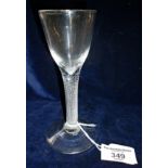 18th c. wine glass with bell bowl and opaque spiral thread stem on folded conical foot, 6" high,