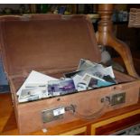 Suede suitcase of old black and white photos & snapshots