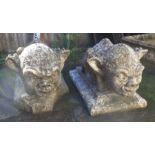 Pair of weathered stonework gargoyle garden ornaments