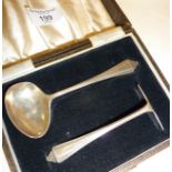 Sterling silver child's spoon and pusher set in case, hallmarked for Birmingham 1947, maker F.L.R.