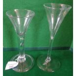 A wine glass having trumpet bowl on a plain drawn stem with an air tear and folded conical foot, 6.