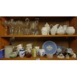 Large quantity of assorted china and glass on two shelves, inc. Wedgwood and cut glass goblets