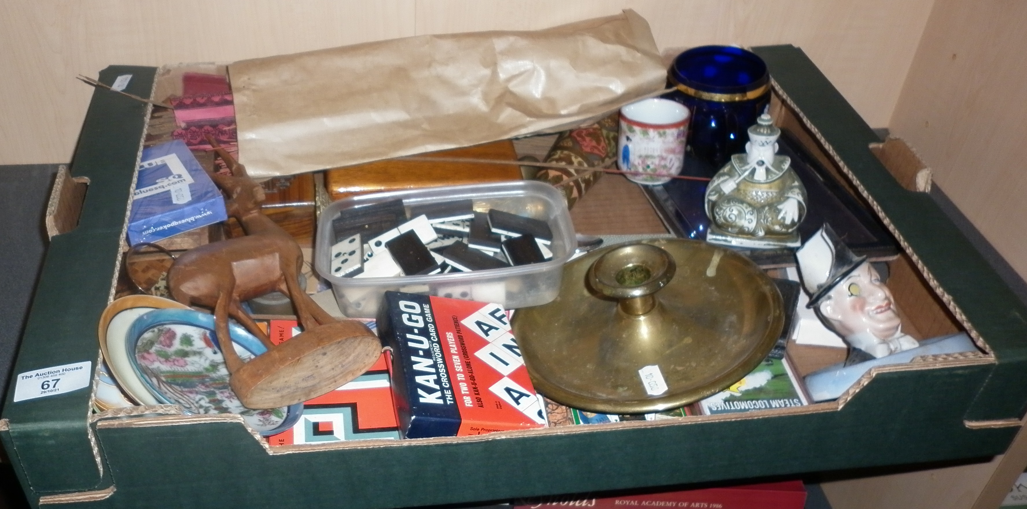 Assorted items including card games and ornaments