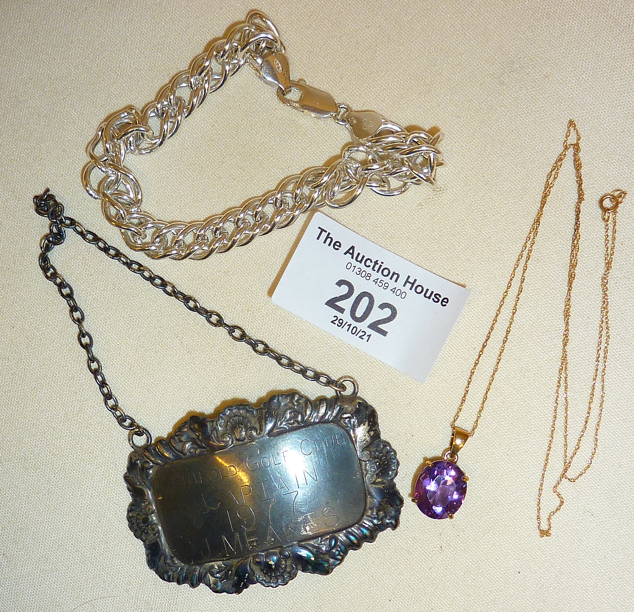 9ct gold chain with amethyst pendant, silver decanter label and a 925 silver bracelet