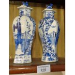 Pair of 19th c. Chinese blue and white hexagonal figures vases with covers, four character marks