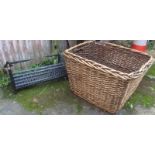 Cast iron fire bucket and a large wickerwork log basket