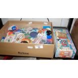 Large quantity of modern plastic and tin badges