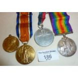 WW1 medal pair marked as 21557 PTE. A.N. WELLINGTON SOM.L.I. (Somerset Light Infantry), and two