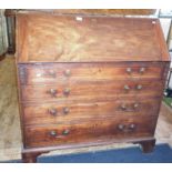 Georgian mahogany bureau with four graduated drawers on bracket feet