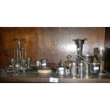 Assorted silver plated items, inc. egg cups on stand with spoons, desk bell, chamberstick, etc.