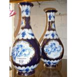 Pair of pate sur pate porcelain vases, 10" tall