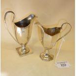 Two Adams style Sterling silver milk jugs, hallmarked for London 1893 Haseler Brothers, and the
