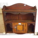 Edwardian mahogany wall shelf with cupboard to centre