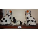 Beswick spaniel - black and white, a Sylvac similar seated and a pair of reproduction