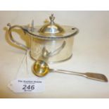 Silver mustard pot and spoon with gilt bowl. Pot hallmarked for Chester 1897. Total weight (