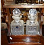 Mahogany 2 bottle tantalus with Stuart Crystal cut decanters