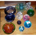 Six various glass paperweights, glass ashtray and other items