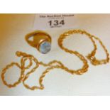 9ct gold ring set with light blue stone and approx. UK size L, and a 9ct rope chain necklace,