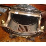 Regency style 19th c. cast iron fire basket with steel and brass embellishments