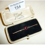 9ct gold bar brooch, set with red stone (cased)