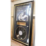 Mounted and framed presentation "The Very Best of" album and signed photograph of Elton John, COA