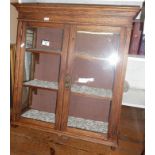 Two-door glazed wall cabinet